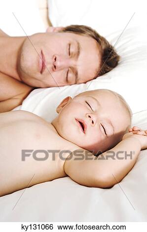Portrait father and baby sleeping, indoors View Large Photo Image Stock Photograph - Portrait father and baby sleeping, indoors. Fotosearch