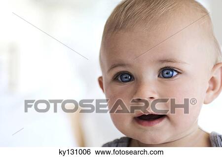 Portrait of a baby, indoors View Large Photo Image Stock Photograph - Portrait of a baby, indoors. Fotosearch