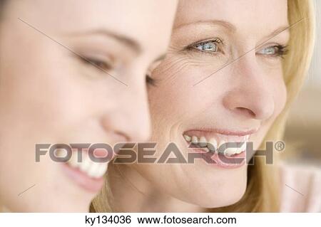 Portrait of three smiling women, indoors View Large Photo Image Stock Photograph - Portrait of three smiling women, indoors. Fotosearch