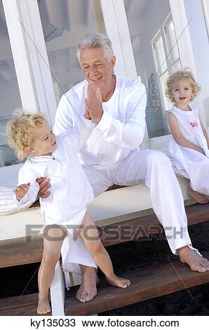Family at home View Large Photo Image Stock Image - Family at home. Fotosearch