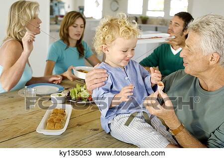 Family at home View Large Photo Image Stock Image - Family at home. Fotosearch