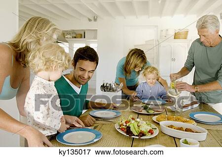 Stock Photo - Family at home. Fotosearch