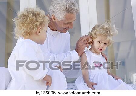 Family at home View Large Photo Image Stock Photograph - Family at home. Fotosearch