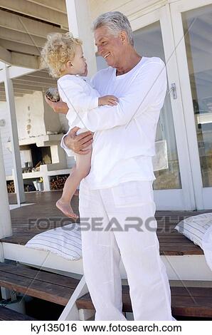 Family at home View Large Photo Image Stock Photograph - Family at home. Fotosearch