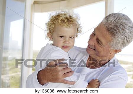 Family at home View Large Photo Image Stock Photograph - Family at home. Fotosearch