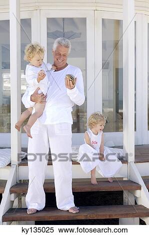 Family at home View Large Photo Image Stock Photography - Family at home. Fotosearch