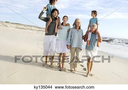 Family on the beach View Large Photo Image Picture - Family on the beach. Fotosearch