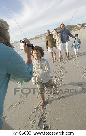 Family on the beach View Large Photo Image Stock Image - Family on the beach. Fotosearch