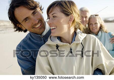 Family on the beach View Large Photo Image Stock Image - Family on the beach. Fotosearch