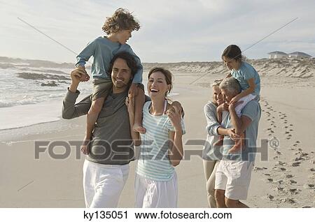 Family on the beach View Large Photo Image Stock Image - Family on the beach. Fotosearch