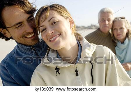 Family on the beach View Large Photo Image Stock Photo - Family on the beach. Fotosearch