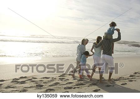 Family on the beach View Large Photo Image Stock Photo - Family on the beach. Fotosearch