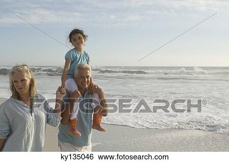 Family on the beach View Large Photo Image Stock Photograph - Family on the beach. Fotosearch