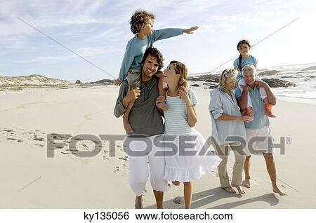 Family on the beach View Large Photo Image Stock Photograph - Family on the beach. Fotosearch