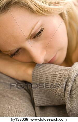 Portrait of a young thinking woman View Large Photo Image Stock Photo - Portrait of a young thinking woman. Fotosearch