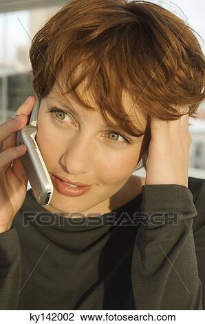 Portrait of a woman phoning View Large Photo Image Stock Image - Portrait of a woman phoning. Fotosearch