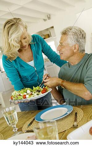 Couple having lunch View Large Photo Image Stock Image - Couple having lunch. Fotosearch