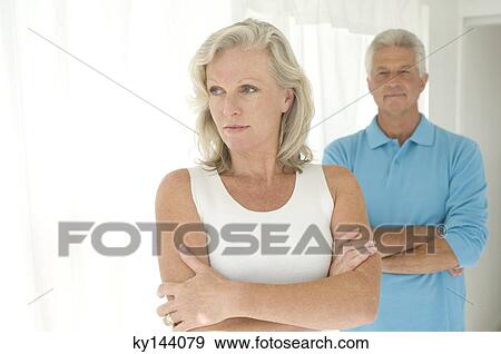 Couple with arms crossed View Large Photo Image Stock Photo - Couple with arms crossed. Fotosearch