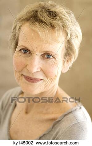 Portrait of smiling senior woman View Large Photo Image Stock Image - Portrait of smiling senior woman. Fotosearch