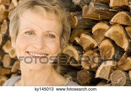 Portrait of smiling senior woman View Large Photo Image Stock Image - Portrait of smiling senior woman. Fotosearch