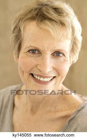 Portrait of smiling senior woman View Large Photo Image Stock Photography - Portrait of smiling senior woman. Fotosearch
