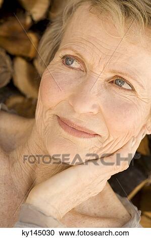 Portrait of thinking senior woman View Large Photo Image Stock Image - Portrait of thinking senior woman. Fotosearch