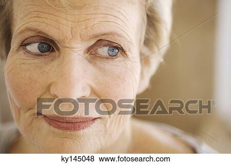 Stock Photo - Portrait of thinking senior woman. Fotosearch