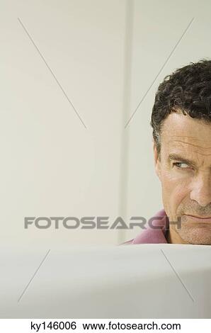 Man's portrait, indoors View Large Photo Image Stock Photograph - Man's portrait, indoors. Fotosearch