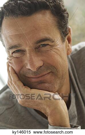 Stock Photography - Man's portrait, indoors. Fotosearch