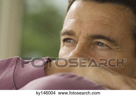 Thoughtful man's portrait, indoors View Large Photo Image Picture - Thoughtful man's portrait, indoors. Fotosearch