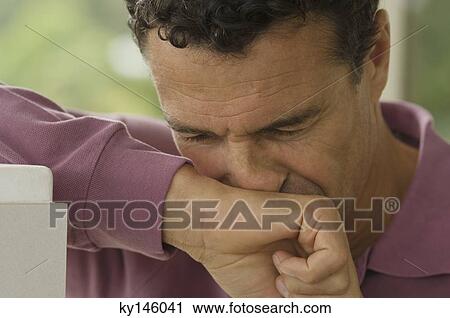 Stock Image - Thoughtful man's portrait. Fotosearch
