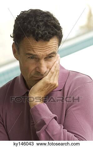 Thoughtful man's portrait View Large Photo Image Stock Image - Thoughtful man's portrait. Fotosearch