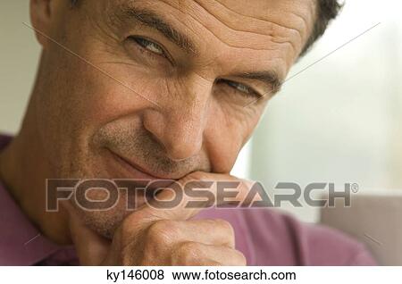 Thoughtfull man's portrait, indoors View Large Photo Image Stock Photo - Thoughtfull man's portrait, indoors. Fotosearch