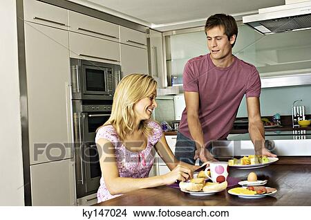 Couple at breakfast View Large Photo Image Picture - Couple at breakfast. Fotosearch