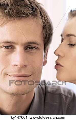 Portrait of woman kissing man View Large Photo Image Stock Image - Portrait of woman kissing man. Fotosearch