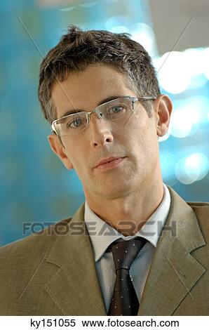 Mid adult businessman, portrait View Large Photo Image Stock Photography - Mid adult businessman, portrait. Fotosearch