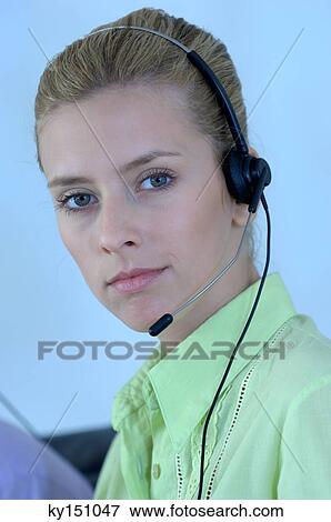 Young businesswoman wearing headset, portrait View Large Photo Image Stock Photo - Young businesswoman wearing headset, portrait. Fotosearch
