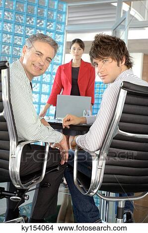 Picture - Business people in office, portrait. Fotosearch