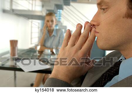 Stock Photo - Businessman with hands joined, close-up. Fotosearch