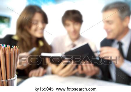 Business people in office with colored pencils in foreground View Large Photo Image Stock Photography - Business people in office with colored pencils in foreground. Fotosearch