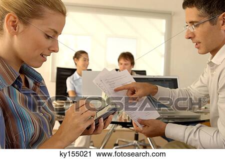 Business people working in office View Large Photo Image Stock Image - Business people working in office. Fotosearch