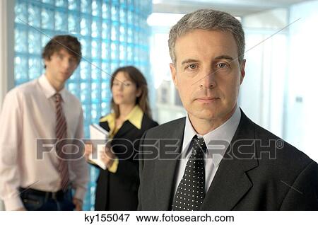 Stock Photo - Mature businessman in office, portrait. Fotosearch