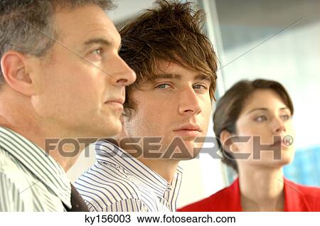 Stock Image - Business people in office, close-up, portrait. Fotosearch
