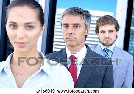 Business people standing in row, portrait View Large Photo Image Stock Photo - Business people standing in row, portrait. Fotosearch