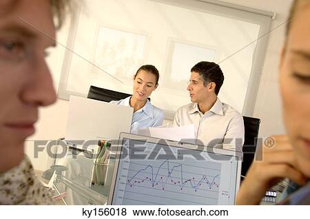 Business people working in office View Large Photo Image Stock Photo - Business people working in office. Fotosearch