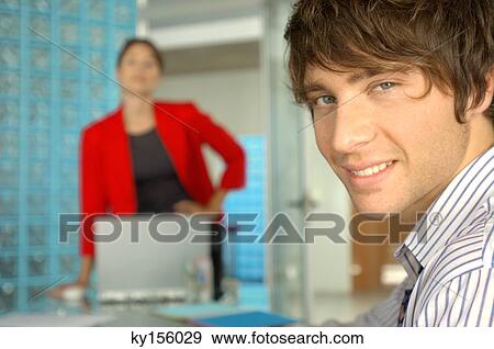 Businessman smiling, portrait View Large Photo Image Stock Photo - Businessman smiling, portrait. Fotosearch
