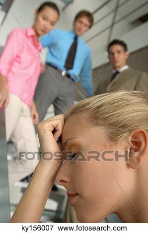 Businesswoman with head on hands, close-up View Large Photo Image Stock Photo - Businesswoman with head on hands, close-up. Fotosearch