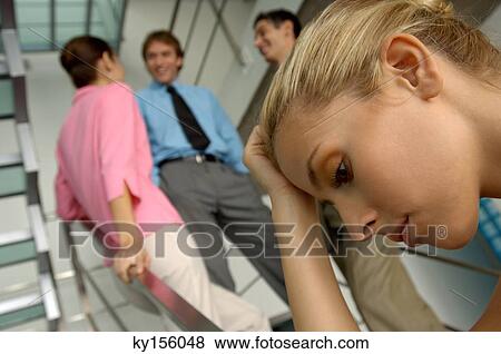Businesswoman with head on hands, close-up View Large Photo Image Stock Photo - Businesswoman with head on hands, close-up. Fotosearch