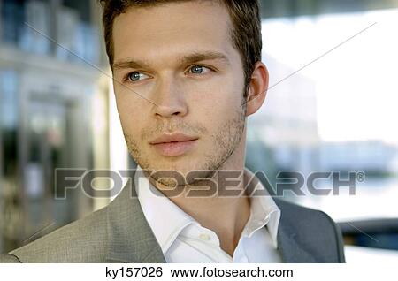 Close-up of a businessman thinking View Large Photo Image Stock Photograph - Close-up of a businessman thinking. Fotosearch