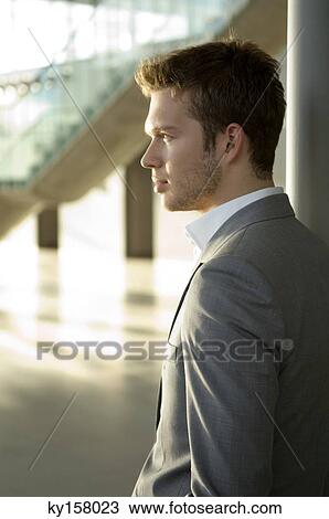 Side profile of a businessman View Large Photo Image Stock Image - Side profile of a businessman. Fotosearch